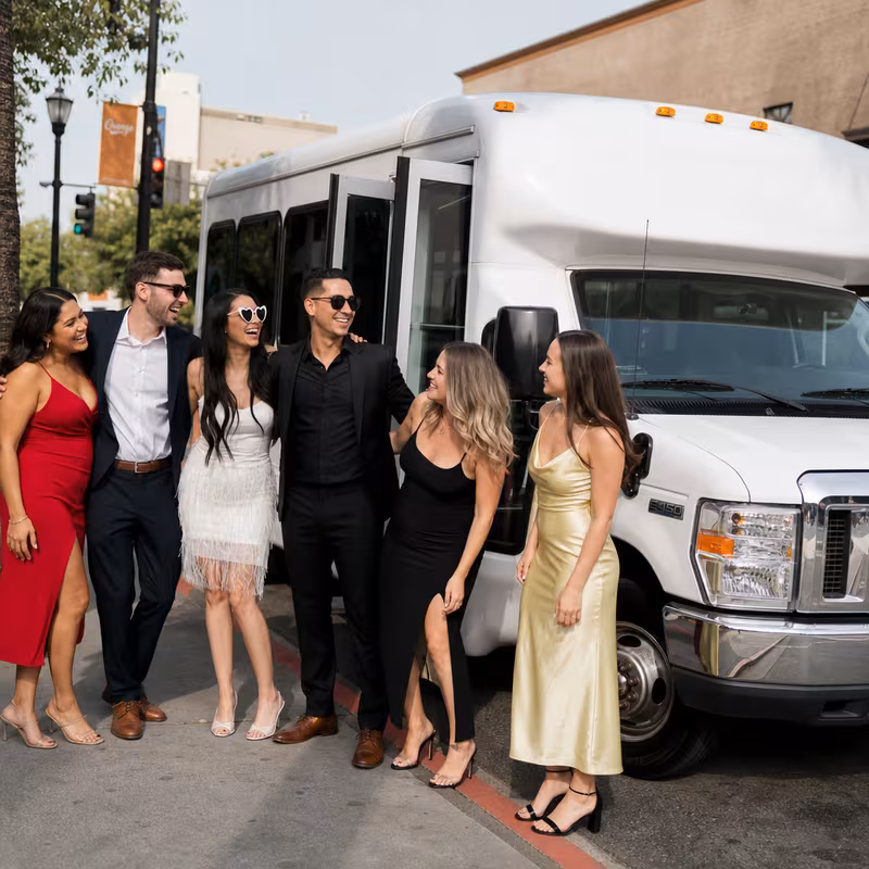 Black Mercedes Sprinter van staged for an Orange Bachelor & Bachelorette Transportation group