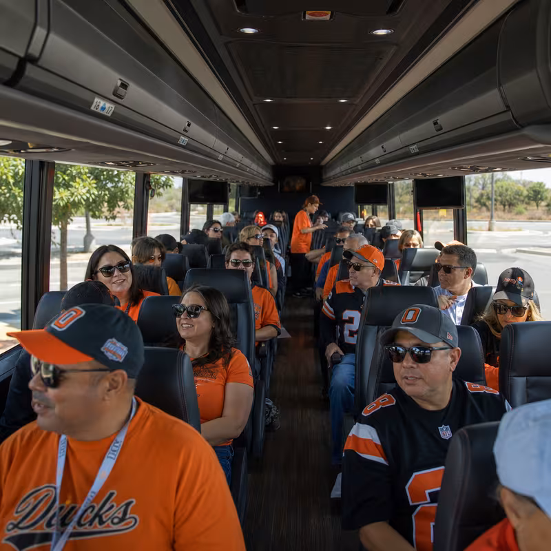 Passenger seating aboard a Orange party bus rental