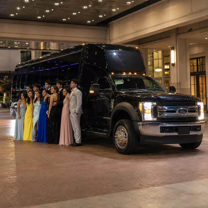 Party bus interior with wraparound leather seating and LED lighting in Orange