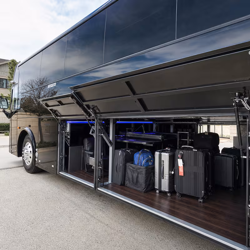 Party bus interior with wraparound leather seating and LED lighting in Orange