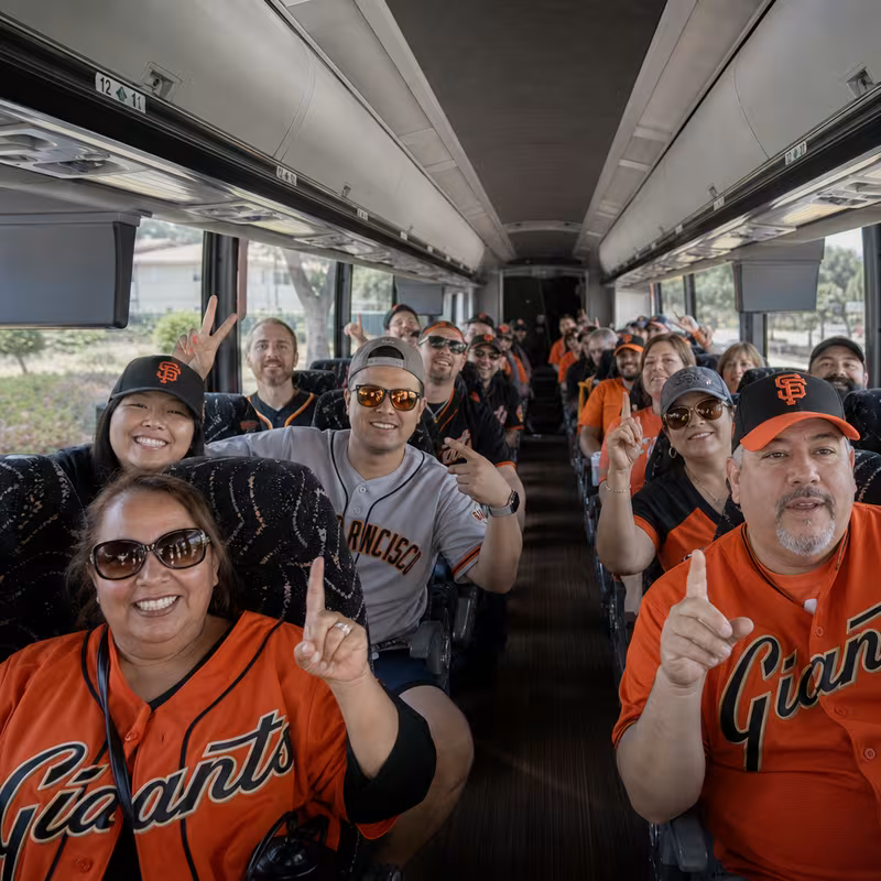 Black Mercedes Sprinter van staged for an Orange Sporting Event Transportation group